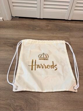 Harrods Cream Drawstring Bag with Gold Logo